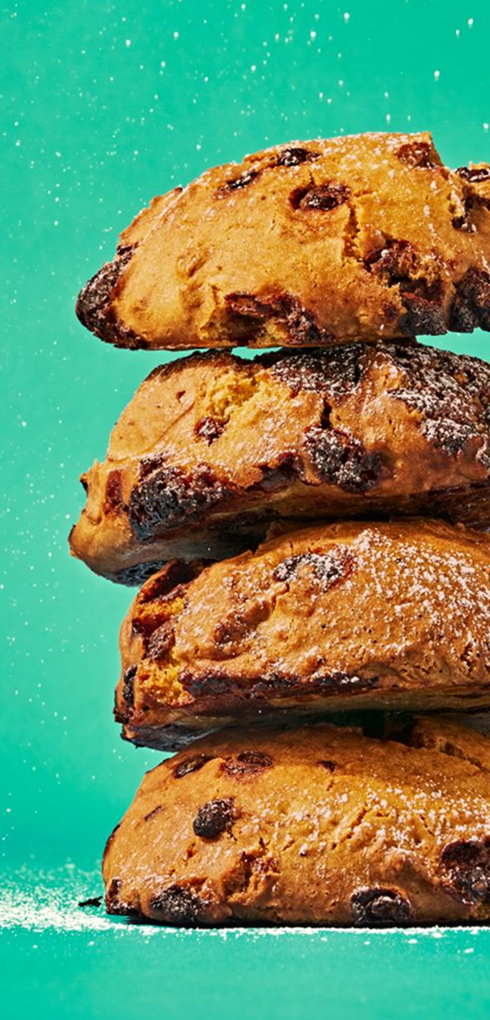 Four Hencraft Chocolate Chip cookies stacked on top of each other.